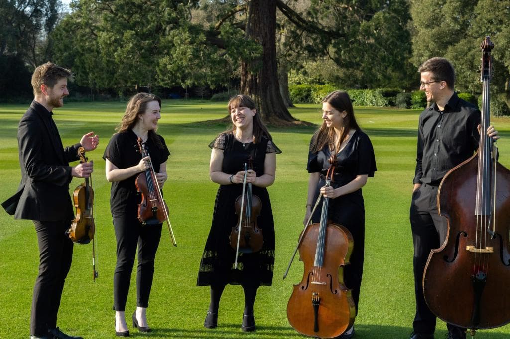 Sophie and a quintet with staff at Wells Cathedral school